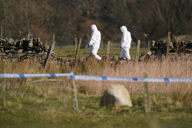 Forensic officers in field
