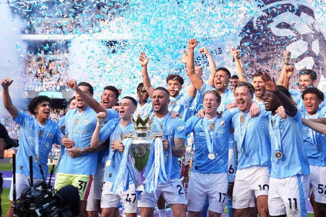 Manchester City’s Kyle Walker lifts the Premier League trophy in 2024