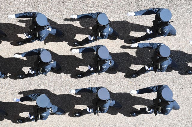 Members of the Royal Air Force arrive for the funeral