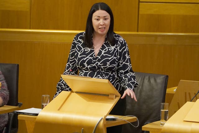 Monica Lennon standing while speaking in Holyrood