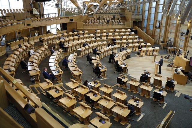 MSPs sitting in Holyrood