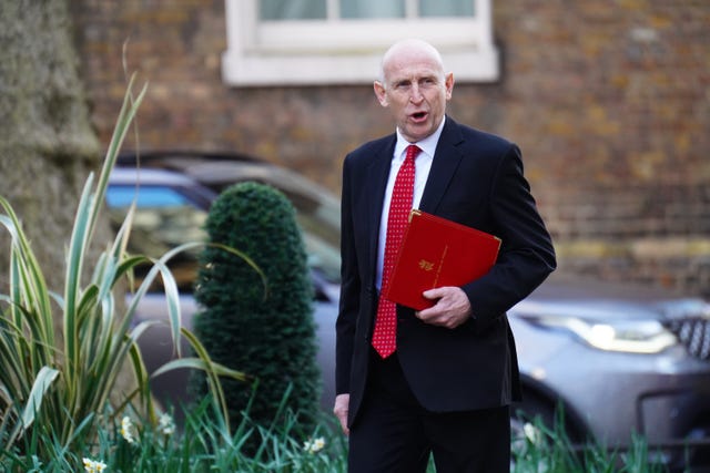 Defence Secretary John Healey walks along Downing Street