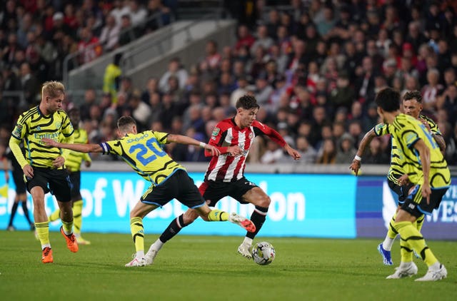 Brentford’s Aaron Hickey breaks past Arsenal''s Jorginho