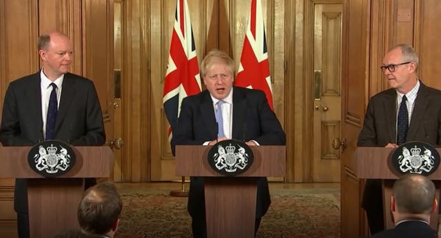Boris Johnson with England's chief medical officer Chris Whitty, left, and chief scientific adviser Sir Patrick Vallance, right