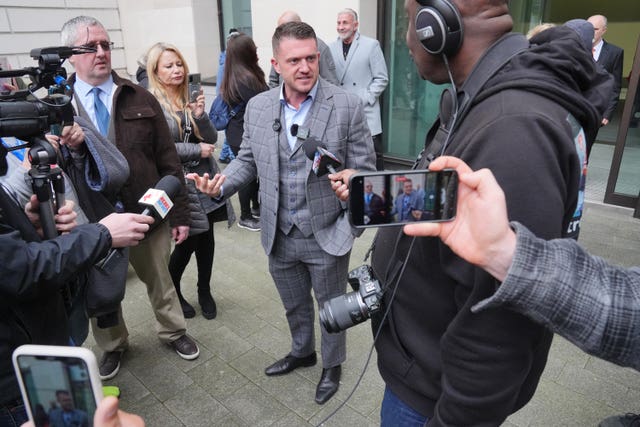 Tommy Robinson, real name Stephen Yaxley Lennon (centre), outside Westminster Magistrates’ Court