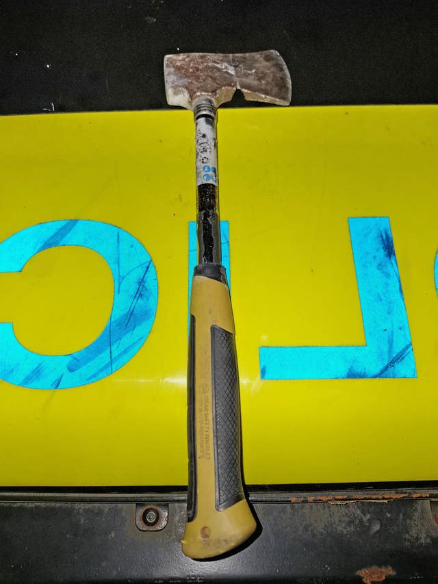 A hatchet thrown at police