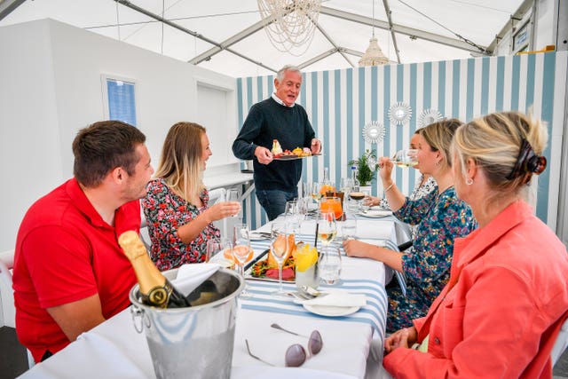 Restaurants in Cornwall are operating at full capacity and are struggling to meet demand due to an influx of visitors this summer (Ben Birchall/PA)