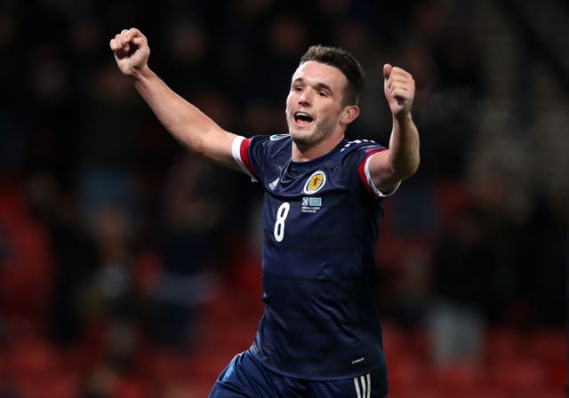 John McGinn celebrate wrapping up victory for Scotland with his second goal of the match