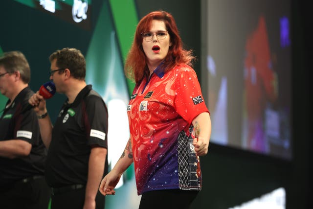 Noa-Lynn van Leuven clenches her fist after winning a leg
