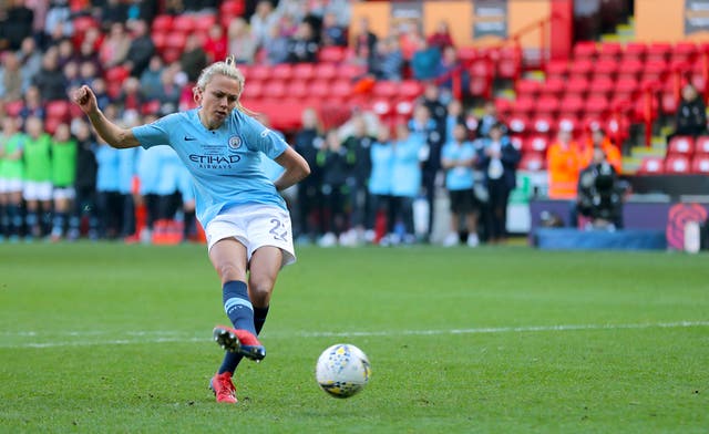 Manchester City’s Claire Emslie scores during the penalty shoot out