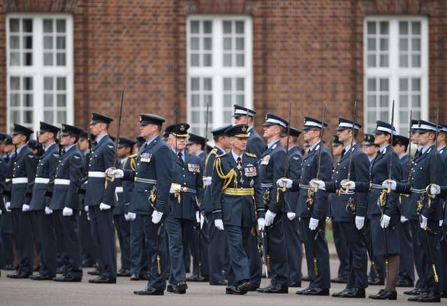 Air Chief Marshal Sir Stephen Hillier reviews ranks of officers and airmen