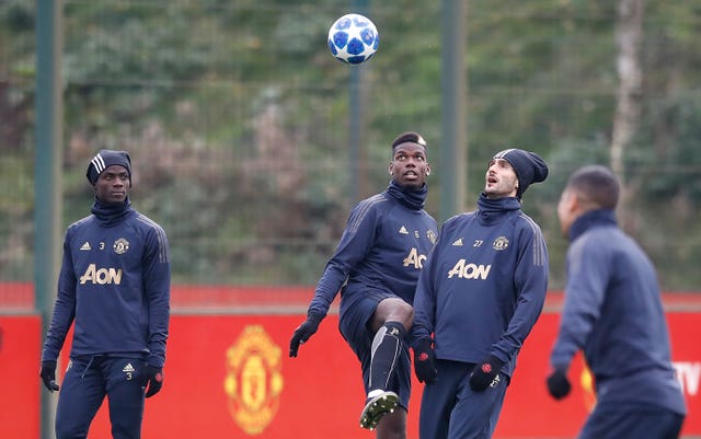 Marouane Fellaini, second right, was back in training after injury