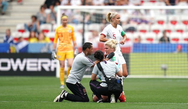 Millie Bright receives treatment against Scotland