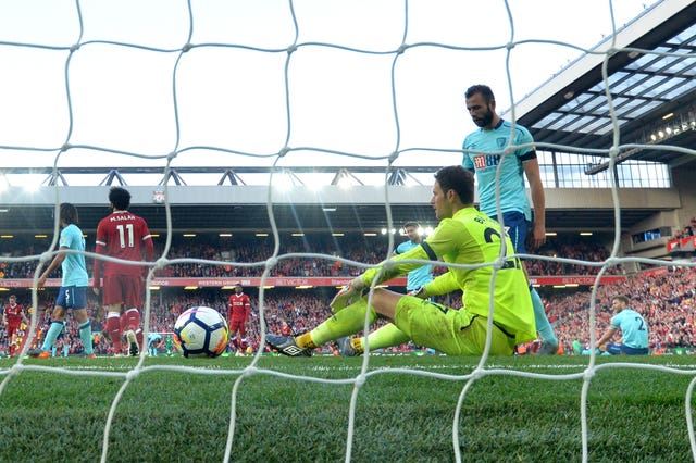 Liverpool’s Roberto Firmino scores his side’s third goal of the game (Anthony Devlin/PA)