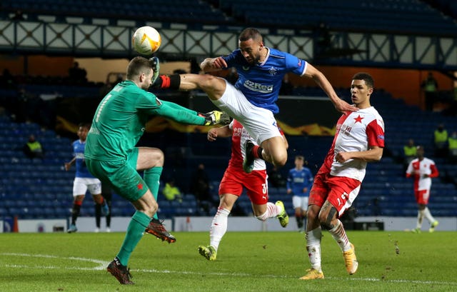 Kemar Roofe's high boot makes contact with the Slavia Prague goalkeepers face