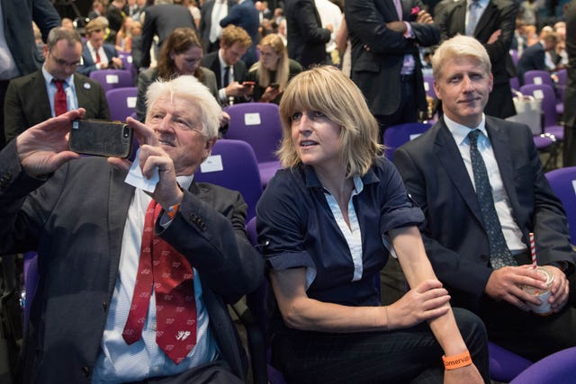 Jo Johnson (right) with his father Stanley and sister Rachel to see his older brother named new Conservative leader (Stefan Rousseau/PA)