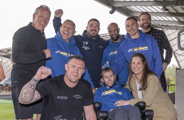 Former rugby league players, from left, back row, Gary Mercer, Barrie McDermott, Matt Diskin, Jamie Jones-Buchanan, Kevin Sinfield, Nick Youngquest and Luke Burgess will all be supporting Sunday's event