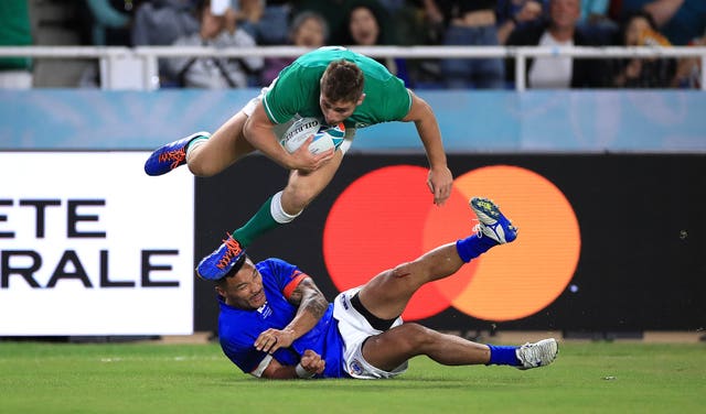 Ireland's Jordan Larmour (top) scores a try against Samoa