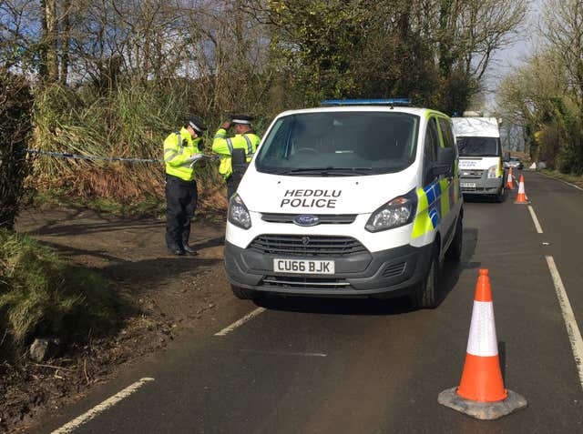 Police at the address in St Clears, Carmarthenshire (Johann Carr/PA)