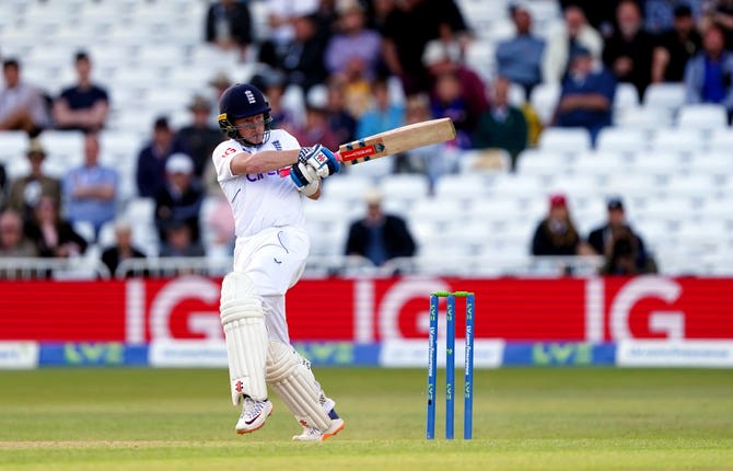 Ollie Pope on his way to an unbeaten half-century