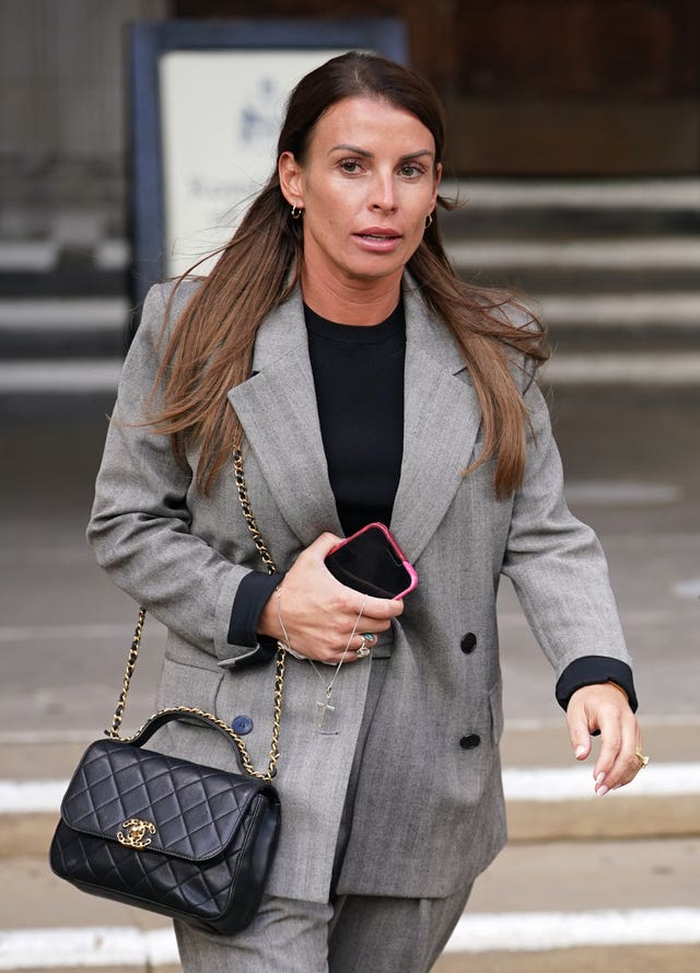 Coleen Rooney leaving the Royal Courts of Justice during the trial (Yui Mok/PA)