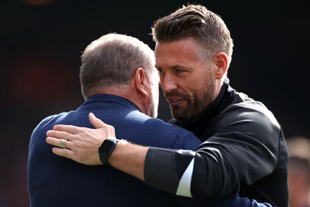Luton manager Rob Edwards, right, and Tottenham boss Ange Postecoglou