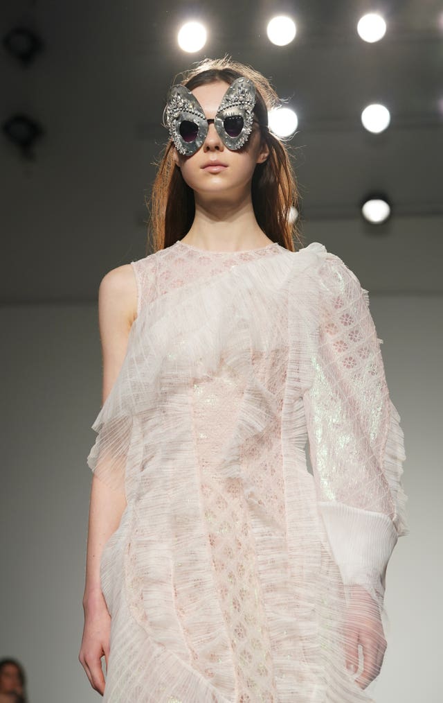 Models on the catwalk during the Bora Aksu Autumn/Winter 2019 London Fashion Week show at the Garden Museum, London.