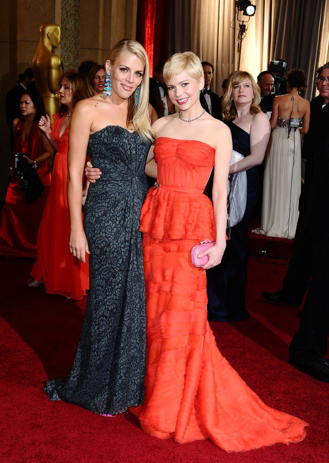 Michelle Williams and Busy Philipps arriving for the 84th Academy Awards (Ian West/PA)