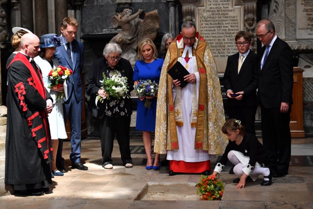 Dean of Westminster John Hall (third right), with Jane Hawking (second left) and daughter Lucy Hawking (centre), presides over the internment of Professor Hawking's ashes