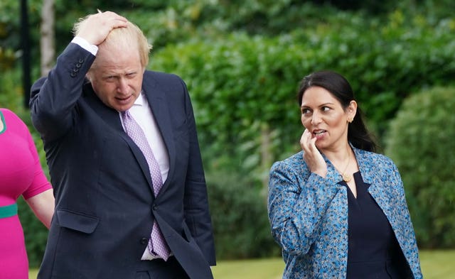 Boris Johnson and Priti Patel