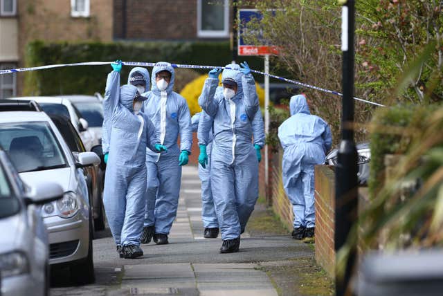 Forensic officers at the scene in South Park Crescent in Hither Green, London (Gareth Fuller/PA)