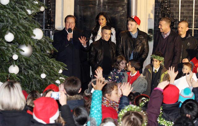 Prime Minister David Cameron with the three X Factor finalists Jahmene Douglas, James Arthur and Christopher Maloney (Lewis Whyld/PA)