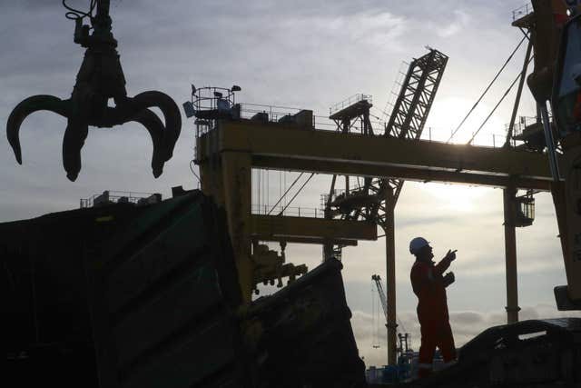A crane operator, at Dales Marine Limited, working on-site at the Leith Imperial Dry Dock, Edinburgh (Jane Barlow/PA)