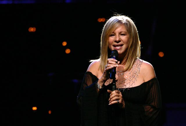 Barbra Streisand performing on stage