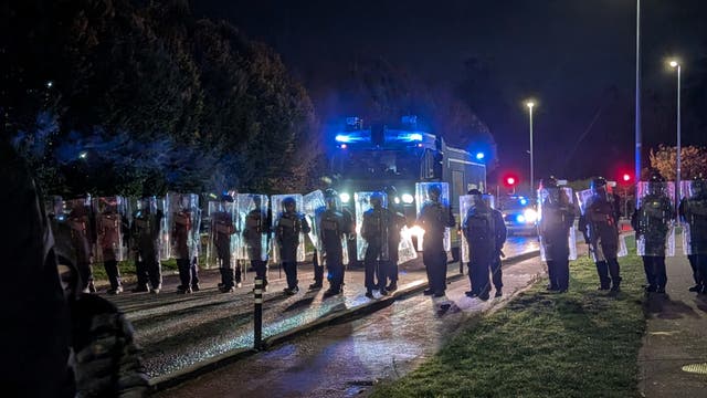 Gardai block protesters as disturbances flared outside the Citywest Hotel