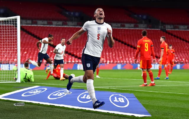 Conor Coady celebrates scoring for England against Wales