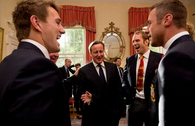 Alun Wyn Jones, centre right, and his team meet Prime Minister David Cameron after the Lions' victorious 2013 tour