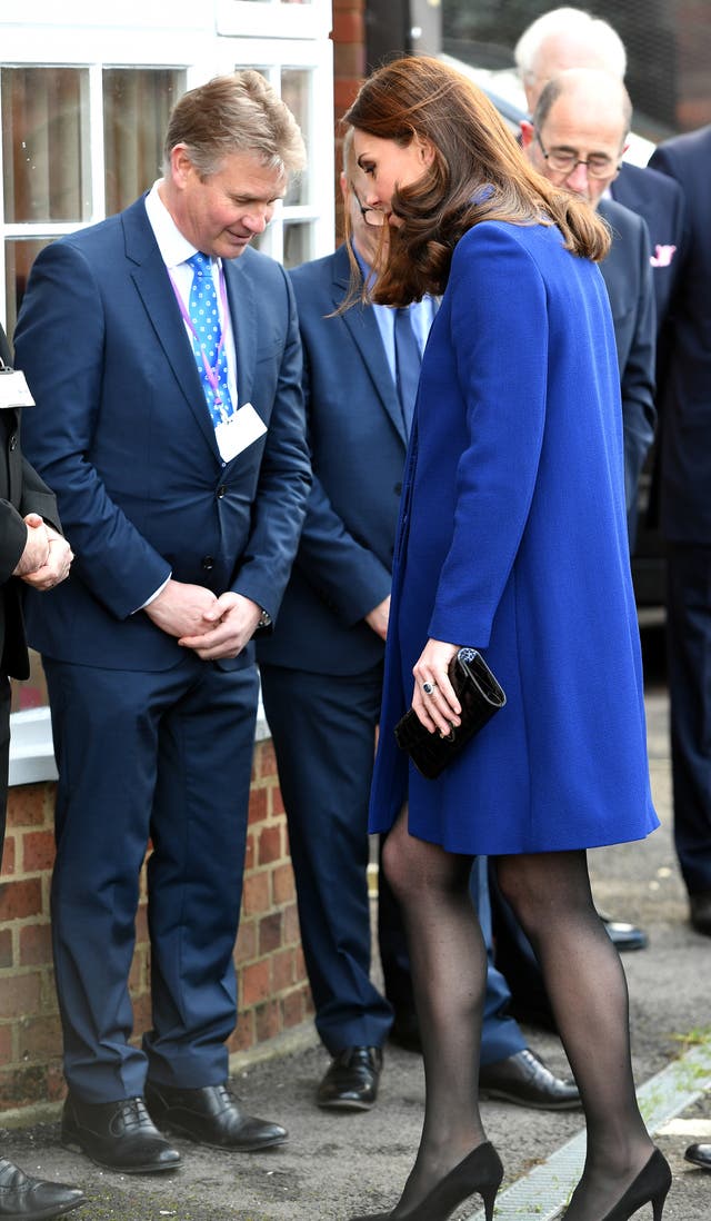 The Duchess of Cambridge, gets her heel caught in a drainage grate as she arrives to open the addiction treatment centre (John Stillwell/PA)