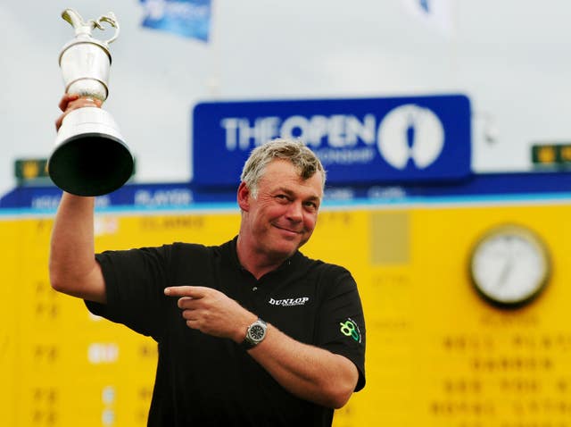 Darren Clarke celebrates with Claret Jug at the 18th after winning the 2011 Open