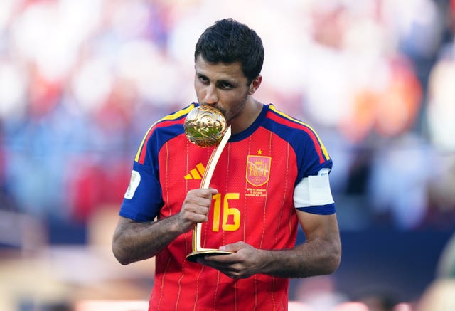 Spain’s Rodri with the Golden Ball award