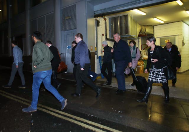 Information Commissioner's Office enforcement staff at the premises of Cambridge Analytica (Yui Mok/PA)