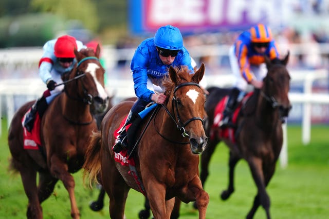 Flight (red hat) was a respectable third behind Desert Flower