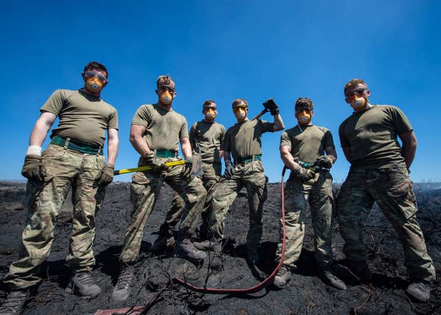 Members of A Company Guns Platoon supporting Great Manchester Fire and Rescue Service on Saddleworth Moor (Sgt Donald Todd/PA)