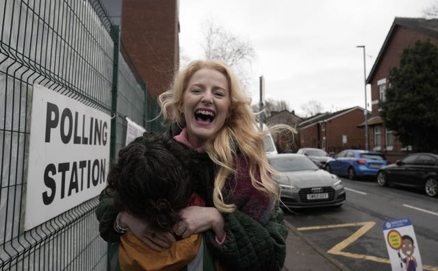 Green Party candidate Hannah Spencer outside the polling station in St Agnes Primary School, Levenshulme