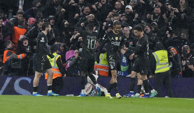 Paris St Germain’s Ousmane Dembele, centre, celebrates his first goal