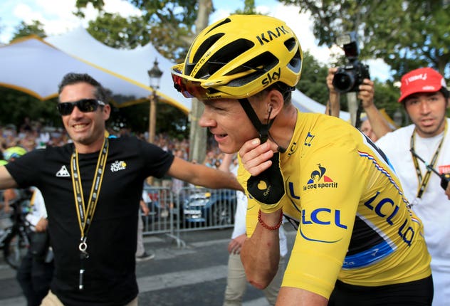 Froome, pictured after sealing victory at the 2016 Tour de France, is Britain's most successful road cyclist