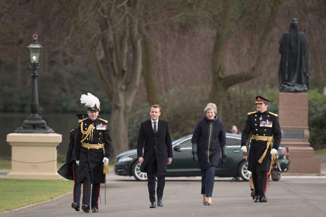 Theresa May and Emmanuel Macron at the UK-France summit at Sandhurst (Stefan Roussea/PA)