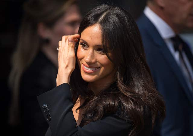 Ms Markle was urged to try out sitting volleyball (Dominic Lipinskiu/PA)