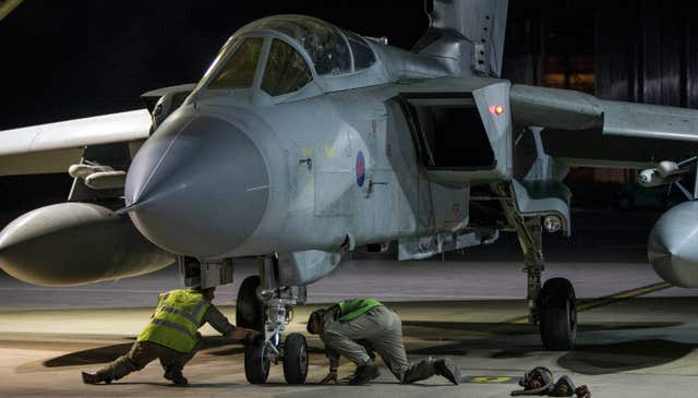 An RAF Tornado taxis into its hangar at RAF Akrotiri after conducting strikes (MoD/PA)