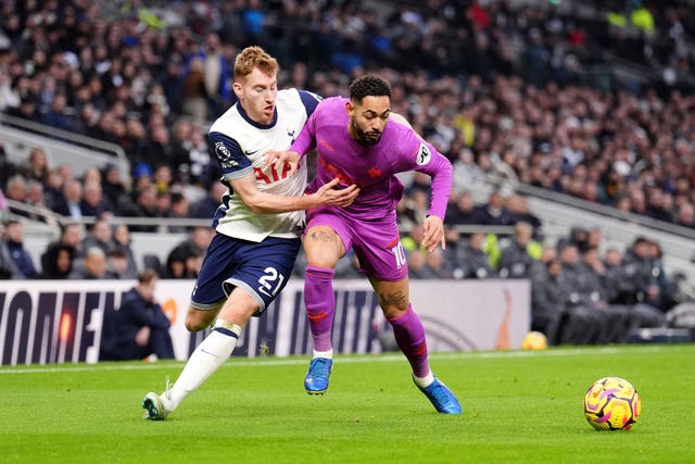 Tottenham Hotspur’s Dejan Kulusevski (left) and Wolverhampton Wanderers’ Matheus Cunha battle for the ball